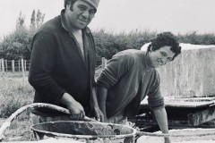 David Murray Jr. and his wife, Jane Murray (née Roretana), at their dairy shed on Matakana Island.
